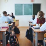 Students in a structured classroom setting representing what parents see when evaluating a private school curriculum