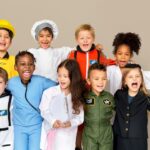 Diverse group of children dressed in career costumes representing the wide range of STEM careers for kids available in the future